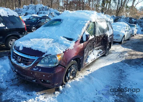 2010 Honda Odyssey Touring z USA, uszkodzony, nr VIN 5FNRL3H95AB042766